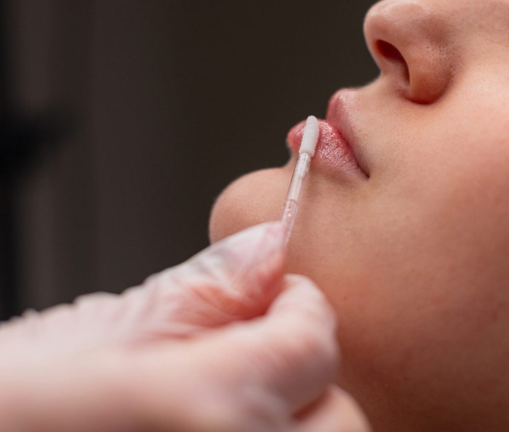 Fresh Beautiful Girl Doing Lip Care In Beauty Clinic